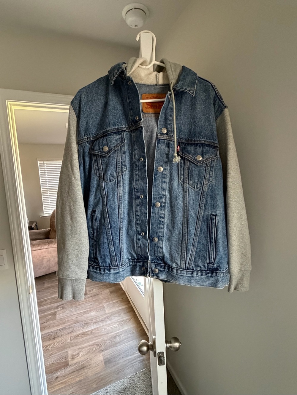 Levi's Blue Denim Trucker Jacket with Gray Hooded Sleeves